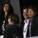 Mick Jagger and L'Wren Scott at the in the Olympic Stadium at the 2012 Summer Olympics, in London - 6 August 2012 - 454 x 301