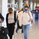 Lisa Rinna – Seen at LAX in Los Angeles - 454 x 551