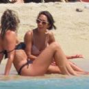 Ashley Roberts – In a black bikini with Janette Manrara on the beach in Mykonos - 454 x 303