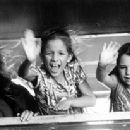 Kate Winslet and her two kids, Carrie Mullan and Bella Rizza wave good-bye from the train in Hideous Kinky