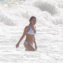 Michelle Rodriguez – In white bikini while vacationing in Tulum - 454 x 303
