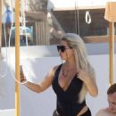 Bianca Gascoigne – Seen in a black swimsuit at Ibiza’s Cala de Bou beach - 454 x 599