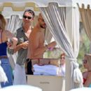 Michelle Hunziker – Seen in Red Bikini at Alpemare Beach in Forte Dei Marmi, Italy - 454 x 303