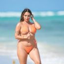 Ara Queen Bae – In a bright orange bikini at the beach in Miami Beach - 454 x 681