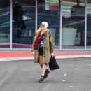 Cara Delevingne – Arrives at Battersea helipad in London