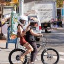 Emily Ratajkowski – On a bike ride with her friend in Soho – New York