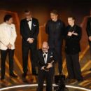 Daniel Brühl, Edward Berger, Malte Grunert, Albrecht Schuch and Felix Kammerer - The 95th Annual Academy Awards  (2023) - 454 x 318
