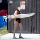 Robin Wright – Surfing at a beach in Malibu