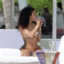 Draya Michele – In bikini on the beach in Cancun