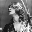 Mick Taylor performs on stage with Jack Bruce at Crystal Palace Garden Party, 7th June 1975