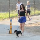 Rainey Qualley – Seen with her dog in Los Angeles - 454 x 454