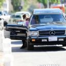 Olivia Wilde – Gets inside Harry Style’s vintage Benz in Los Angeles