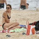 Rebecca Judd in Black Bikini on holiday in Noosa - 454 x 324