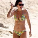 Rhea Durham – In a lemon print bikini on the beach in Barbados