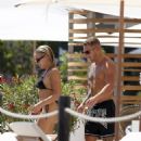 Gabby Allen – In a black bikini by the pool at Nobu Hotel in Ibiza - 454 x 568