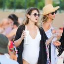 Cassandra Jean in White Swimsuit on thr beach in St. Barts
