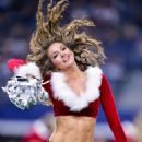 Dallas Cowboys Cheerleaders in Santa Suits – Performing an NFL football game in Arlington - 454 x 648