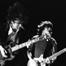 Angus and Malcolm Young of AC/DC, performing in Royal Oak, Michigan; September 13, 1978 - 454 x 363