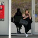 Rita Simons – Arrive at the Slough Ice Arena for practice - 454 x 334
