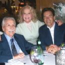 Betty Brosmer  with Joe Weider (husband),   Arnold Schwarzenegger - 454 x 353