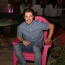 Actor Josh Henderson attends the NYLON Midnight Garden Party at a private residence on April 10, 2015 in Bermuda Dunes, California - 400 x 600