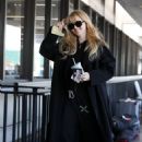 Kathryn Newton – Catches a flight at LAX in Los Angeles - 454 x 681
