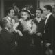 Alice Faye (center), Jack Haley (left), Don Ameche, and Tyrone Power (right), in a trailer for Alexander's Ragtime Band (1938)