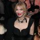 Courtney Love dazzles in a corseted black dress at Dior Homme Menswear Fall-Winter 2023-2024 Show at Paris Fashion Week