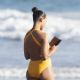 Zoe Saldana – In a yellow swimsuit in Malibu