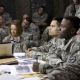 MICHAEL PEÑA (left center) and DEREK LUKE (right center) star in LIONS FOR LAMBS, a powerful and gripping story that digs behind the news, the politics and a nation divided to explore the human consequences of a complicated war. The film is a Metro-Goldwy