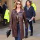Shania Twain – Wearing a brown leather coat and flares at the BBC studios in London