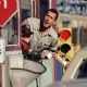 Adam Sandler and Cole and Dylan Sprouse work the tollbooth in Big Daddy