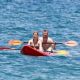 Jennette McCurdy wearing a pretty bikini and board shorts was spotted kayaking with a male friend in Maui