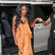 Kenya Moore – Wearing a bright orange dress at Bauer Media offices in London