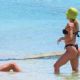 Ashley Roberts – In a black bikini with Janette Manrara on the beach in Mykonos