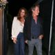 Cindy Crawford looks ultra-chic in a satin top and blazer as she heads out for a romantic dinner with husband Rande Gerber in Santa Monica
