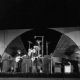 Beatles performing on stage at the Hollywood Bowl on August 23, 1964 with 18,000 frenzied fans in attendance