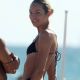 Candice Swanepoel – In a black bikini at the beach in Miami