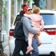 PICTURE EXCLUSIVE: Irina Shayk links arms with Bradley Cooper as pair dote on daughter Lea en-route to family Thanksgiving - amid rumors pair have rekindled their romance