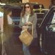 Cindy Crawford – In a tweed coat and blue jeans at the famous Beverly Hills Hotel