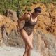 Paula Patton in Animal Print Swimsuit on Malibu Beach