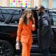 Lily Collins – Arrives at the Crosby Hotel in a fashionable red pantsuit in New York