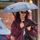Irina Shayk – Walk under the rain in New York