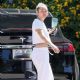 Miley Cyrus – Wearing white sweat pants and a white crop top while out in Malibu