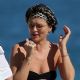 Kate Moss in Black Swimsuit on the beach in Miami
