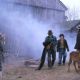 Barn fire. Kris Kristofferson as Quebec Bill (middle left) and Charlie McDermott as Wild Bill Bonhomme (middle right) in Truly Indie's Disappearances