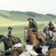 Button (Diego Luna, left), Charley Waite (Kevin Costner, center), and Mose Harrison (Abraham Benrubi, right) drive cattle on the open range, the one place where a man can be free.