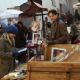 (L-R) Meggie (ELIZA HOPE BENNETT) and Mo (BRENDAN FRASER) peruse vintage novels at a book market in New Line Cinema's fantasy adventure 'Inkheart,' also starring PAUL BETTANY, HELEN MIRREN, JIM BROADBENT and ANDY SERKIS. This film is distribut