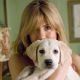 Jenny (Jennifer Aniston) gets acquainted with new puppy Marley. Photo credit: Barry Wetcher. © 2008 Twentieth Century Fox and Regency Enterprises. All rights reserved.
