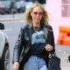 Tish Cyrus – Is walking with a friend in Soho